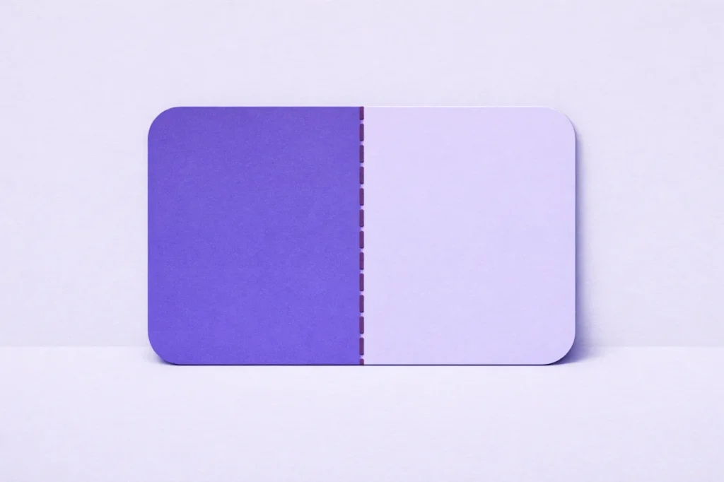 Paper cut card partitioned into two halves representing sticky and cashable bonus structures